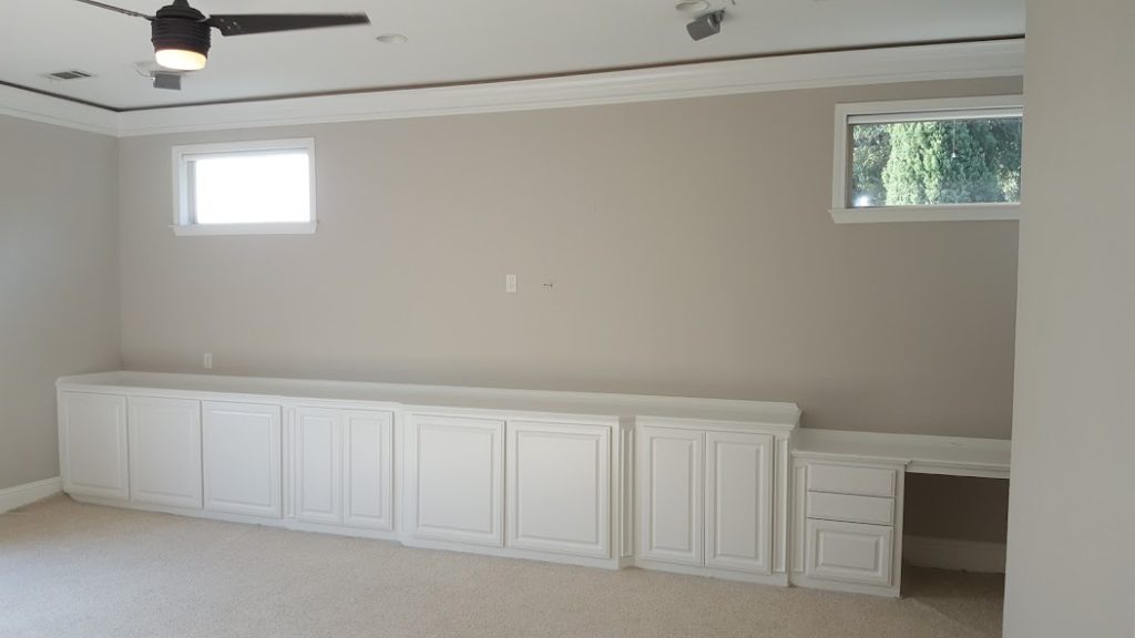 Media room with brand new custom cabinets & paint